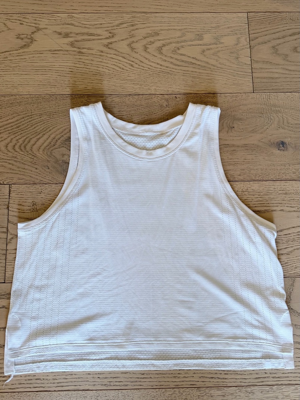 Lululemon train to be tank high low hem